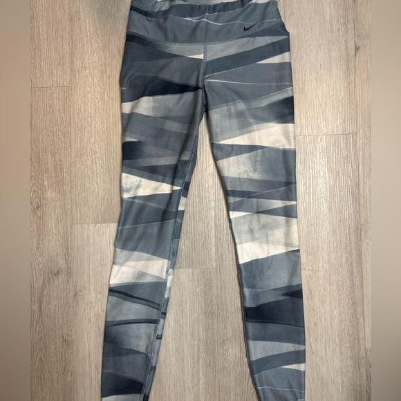 Nike Dri-Fit Legend Leggings
Size: XS
Color: Gray/White abstract stripe pattern - Picture 2 of 4
